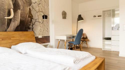 Giniushomes Apartment Am Bahnhof ,, Asian Elephant Room"