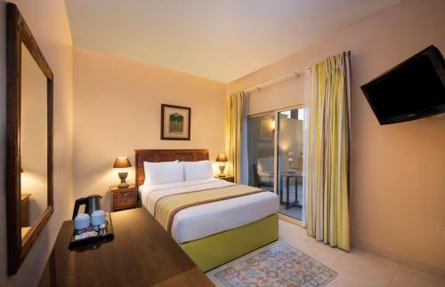 Hotel Al Hamra Village Golf And Beach Resort