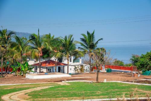 Villa Saffronstays Coral Hues