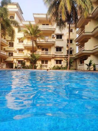 Seacoast Retreat- Lovely 2 Bhk Apartment With Pool