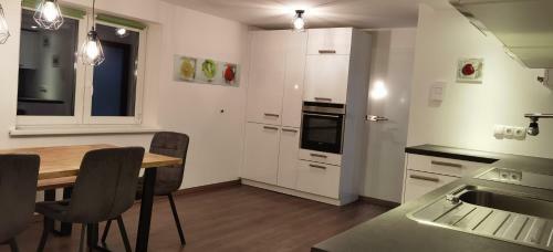 Apartamento Haus Tisch