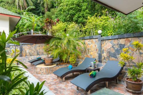 Private Poolvilla Mit Wasserfall