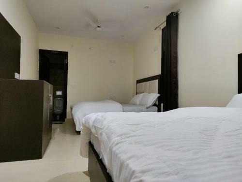 Tatsat Hostel Tapovan