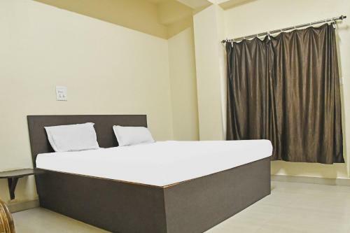 Hotel Capital O 87596 The Nest Inn