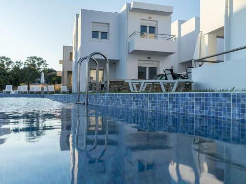 Welcoming Holiday Home In Gennadi With Shared Swimming Pool