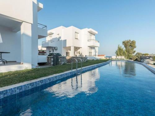 Ravishing Holiday Home In Gennadi With Shared Swimming Pool