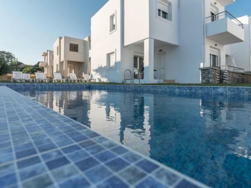 Ravishing Holiday Home In Gennadi With Shared Swimming Pool