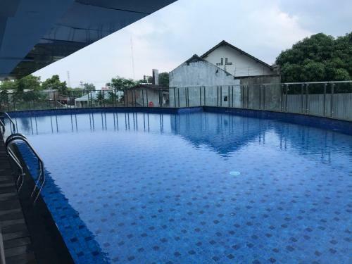 Apartamento The Wongso Patraland Amarta