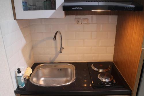 Apartamento The Wongso Patraland Amarta