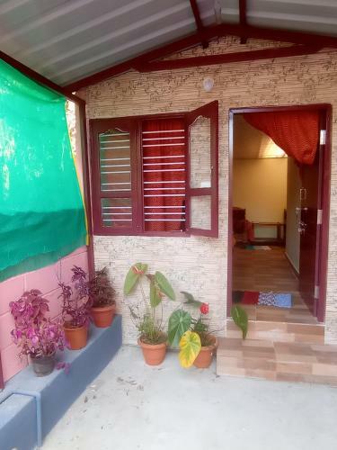 Agroturismo Dreams River View Homestay Coorg B