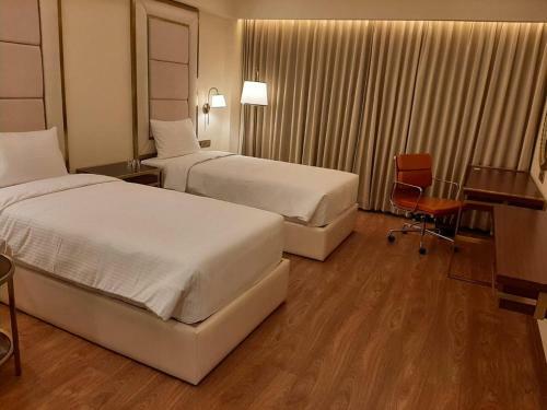 Kay-em Spectra Hotel