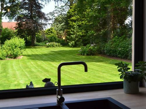 Charming Holiday Home In Oosteeklo With Garden