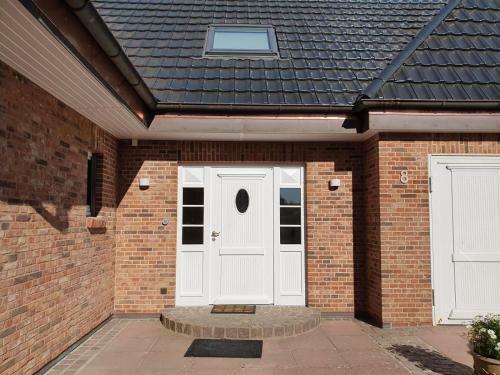 Apartamento Haus Westsee Og Friesenstil Modern