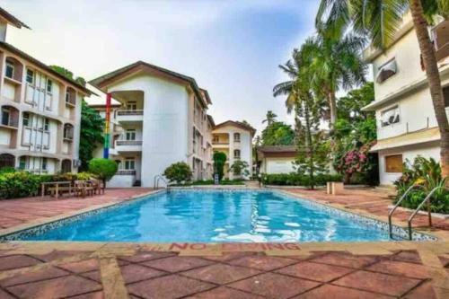 Comfortable 1bhk Apartment With Pool Candolim By Casa Stay