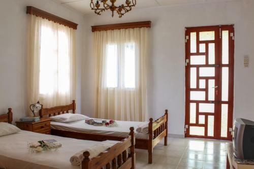 Pelagion II Sea Coral - Beachfront Holiday Home