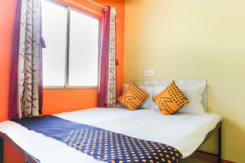 Hotel Spot On 63107 Trimurti Yatri Niwas