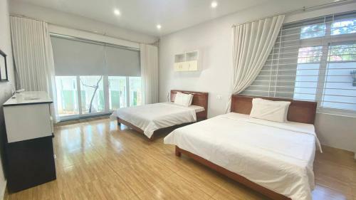 Villa H? B?i G?n Bi?n Longcung Resort