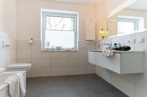 Apartamento Haus-seeblick-in-bosau-wohnung-3