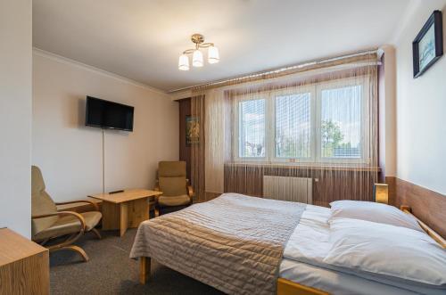 Pokoje Go?cinne I Apartamenty Krup�wki 19