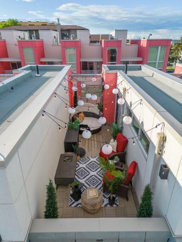 The Noma I Private Rooftop Patio I Marda Loop I Tv