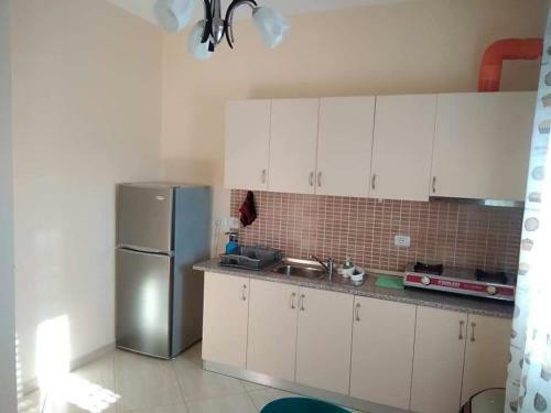 Collaku Apartment's, Official