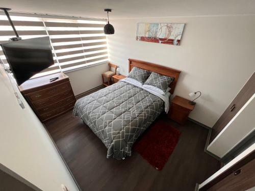 Apartamento Departamento Ejecutivo En Edificio Chacabuco, Amoblado 2d+2b, Estacionamiento.