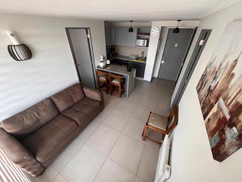 Apartamento Departamento Ejecutivo En Edificio Chacabuco, Amoblado 2d+2b, Estacionamiento.