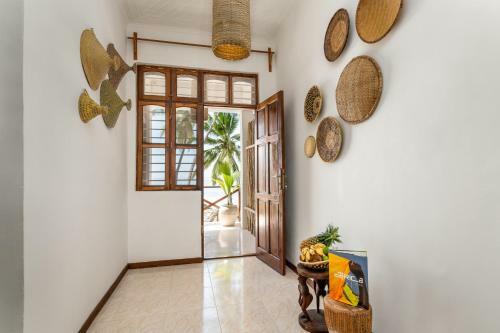 Kima Serviced Beach House & Suites