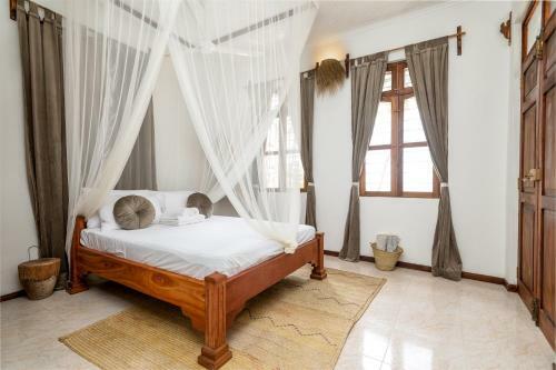 Kima Serviced Beach House & Suites