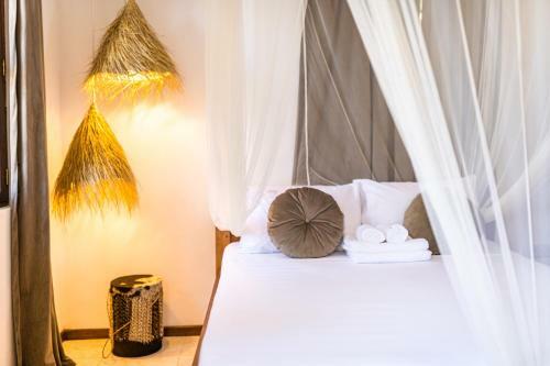 Kima Serviced Beach House & Suites