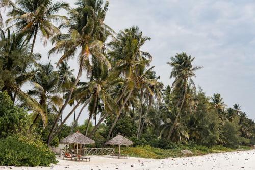 Kima Serviced Beach House & Suites