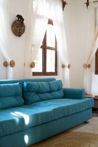 Kima Serviced Beach House & Suites