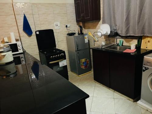 Apartamento Amani Homes 7