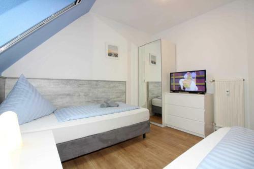 Apartamento Seepark Burhave _ Reetdachhaus Neu