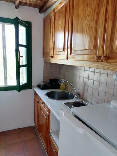 Traditional House In A Settlement In Paros