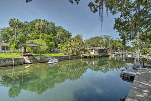 Canal-front Barefeet Retreat Dock And Kayaks