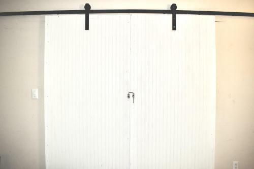 Lovely Barn Door Sunroom!
