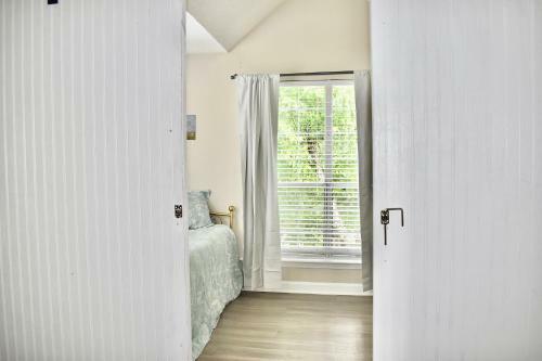 Lovely Barn Door Sunroom!