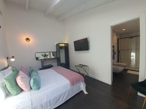 Hostal Belu - Fondi Holiday Rooms