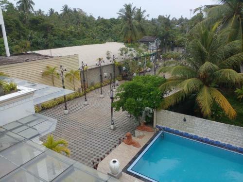 Hotel Amaa River Garden