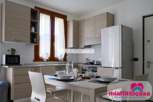 Apartamento Pace Dei Tigli - Bilocale Con Taverna E Giardino