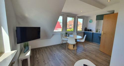 Apartamento Friesenmeer Ferienwohnung Vier