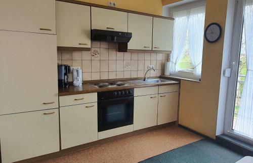 Apartamento Friesenmeer Ferienwohnung Sieben
