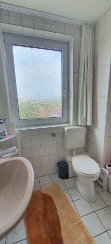 Apartamento Friesenmeer Ferienwohnung Sieben