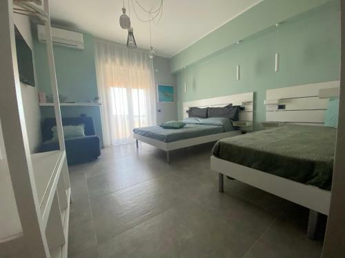 Hostal Oltremare Rooms