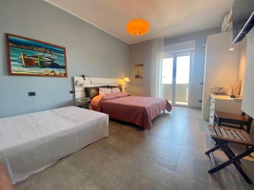 Hostal Oltremare Rooms