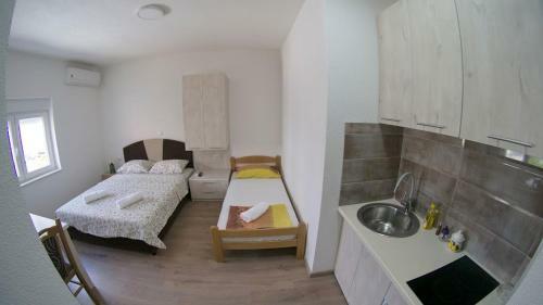 Apartmani Tom