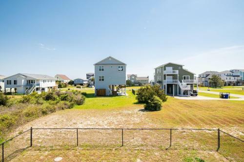 Dolphin Waves By Oak Island Accommodations
