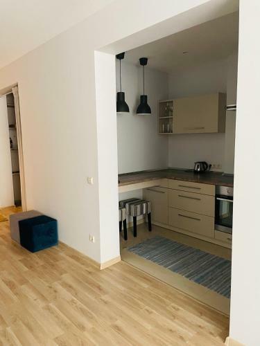Apartamentas Tarp Pusu