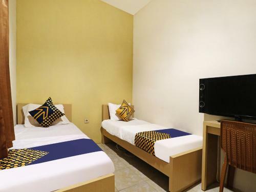 Hotel Spot On 91504 de Vila Ungu Syariah